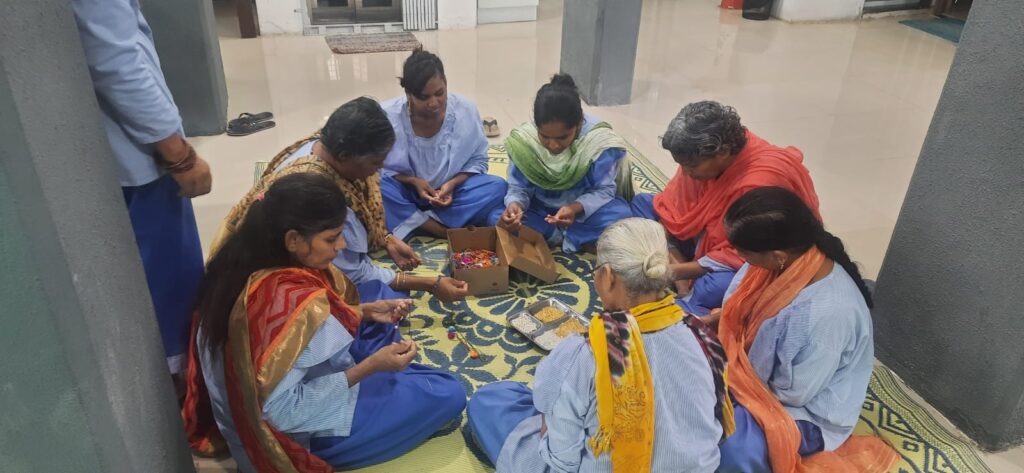 Making Rakhis by women